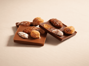 Carrés de chocolat noir et lait avec amandes et noisettes caramélisées, raisins secs et pistaches - 220g